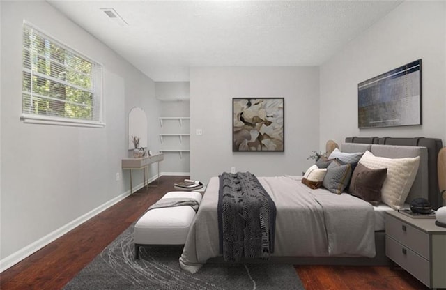 1781 Jajef Ave, Conley, GA 30288 - bedroom with visible vents, baseboards, and wood finished floors