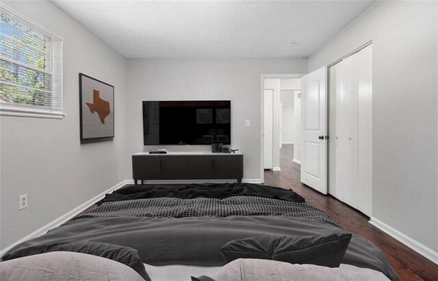 1781 Jajef Ave, Conley, GA 30288 - bedroom with baseboards, wood finished floors, and a closet