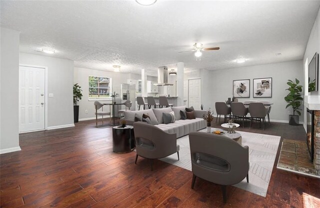 1781 Jajef Ave, Conley, GA 30288 - living room featuring ceiling fan, baseboards, and wood finished floors