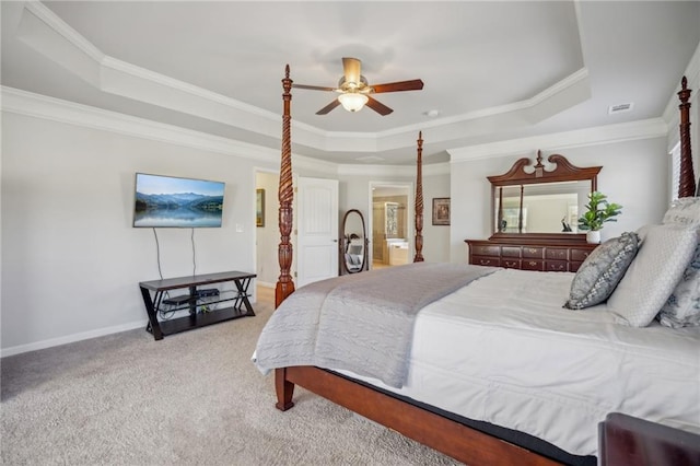 3610 Ansley Manor Ct, Cumming, GA 30028 - carpeted bedroom featuring a tray ceiling, ornamental molding, baseboards, ceiling fan, and ensuite bath