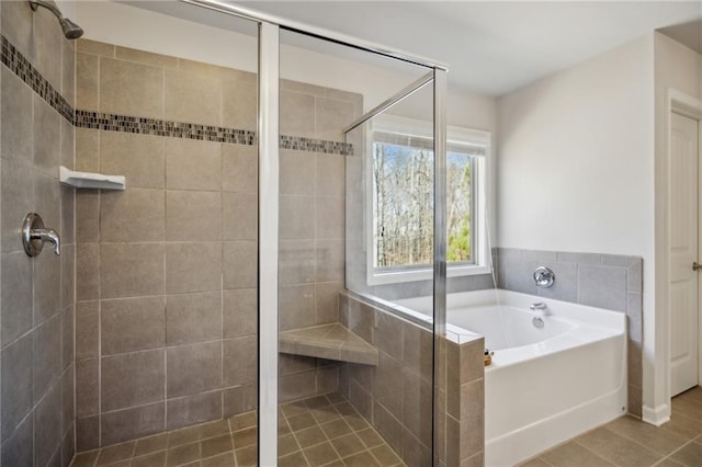3610 Ansley Manor Ct, Cumming, GA 30028 - full bathroom with a shower stall, a bath, and tile patterned floors