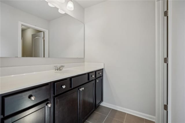 3610 Ansley Manor Ct, Cumming, GA 30028 - bathroom with vanity, tile patterned flooring, and baseboards