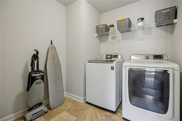 3610 Ansley Manor Ct, Cumming, GA 30028 - laundry area with washing machine and clothes dryer and baseboards