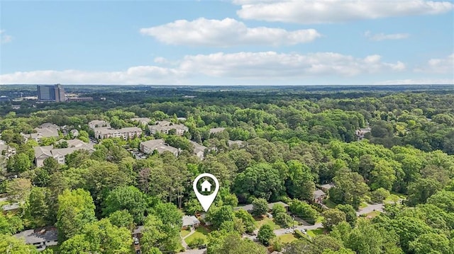 aerial view featuring a view of trees
