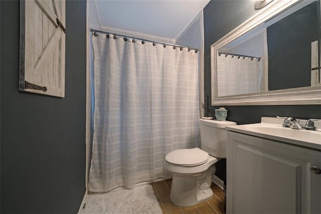 57 Jonathan Rd, Riverdale, GA 30274 - full bathroom featuring wood finished floors, toilet, and vanity