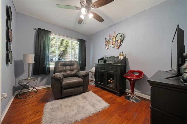 57 Jonathan Rd, Riverdale, GA 30274 - living area featuring a ceiling fan, wood finished floors, and baseboards