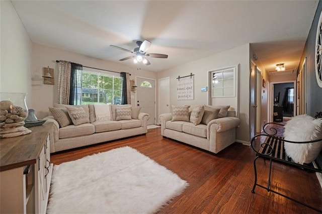 57 Jonathan Rd, Riverdale, GA 30274 - living room featuring dark wood-type flooring and a ceiling fan