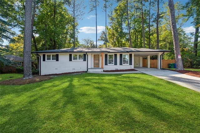 ranch-style home featuring a front yard and a carport