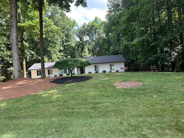 1360 Bethany Ct, Alpharetta, GA 30004 - back of property with a yard