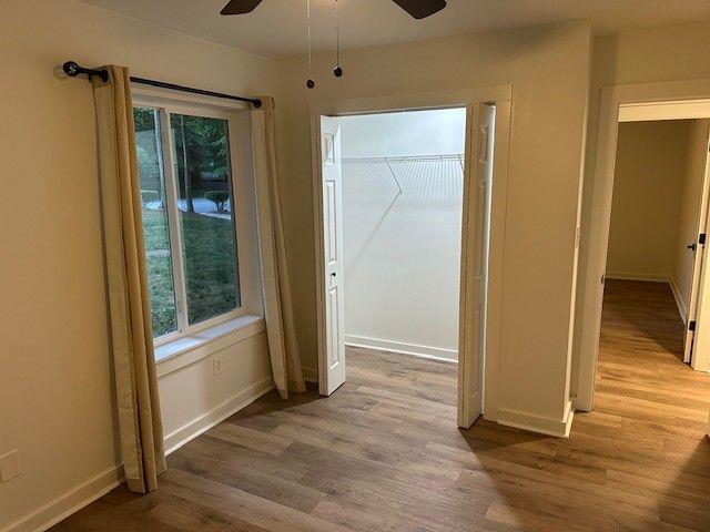 1360 Bethany Ct, Alpharetta, GA 30004 - unfurnished dining area with ceiling fan and wood finished floors