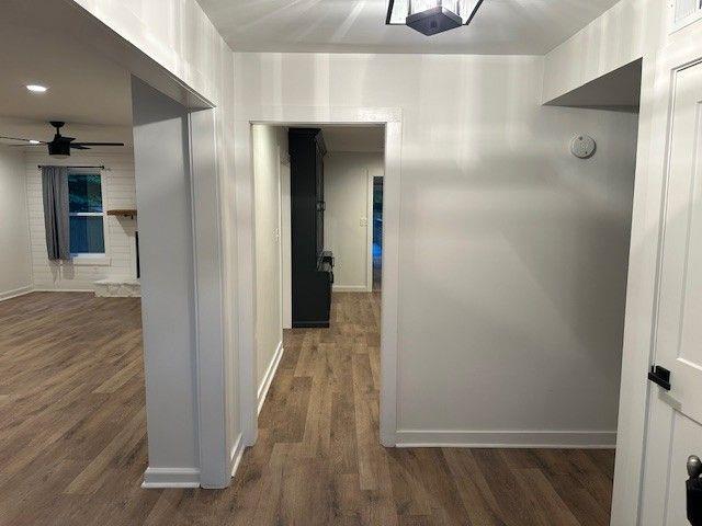 1360 Bethany Ct, Alpharetta, GA 30004 - hallway with wood finished floors and baseboards