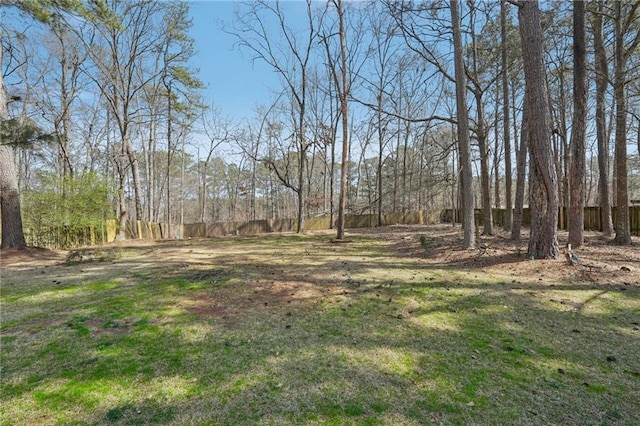 view of yard featuring fence