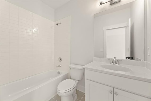 full bathroom featuring vanity, toilet, tile patterned floors, and tiled shower / bath