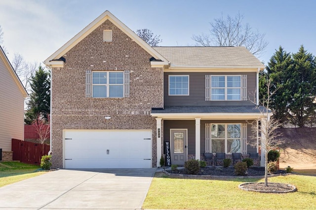 view of front of home with a garage, concrete driveway, brick siding, and a front lawn