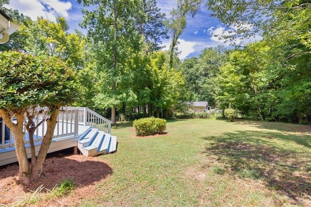 view of yard featuring a deck