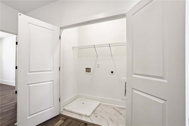 laundry room with dark wood finished floors, laundry area, hookup for a washing machine, and hookup for an electric dryer