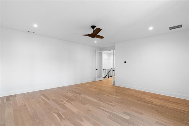 spare room with light wood-type flooring