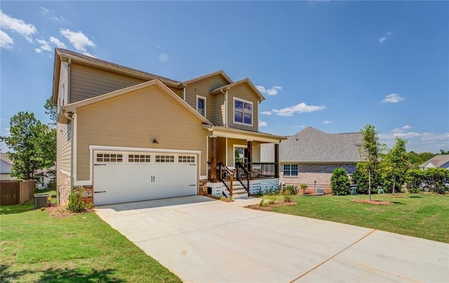 view of front of house featuring covered porch, a garage, central AC, and a front lawn