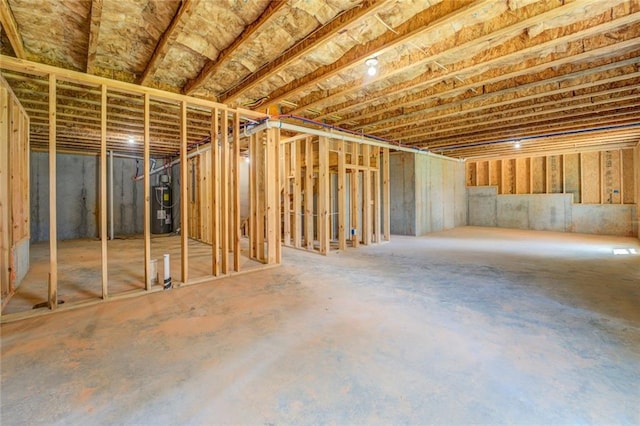 basement featuring water heater