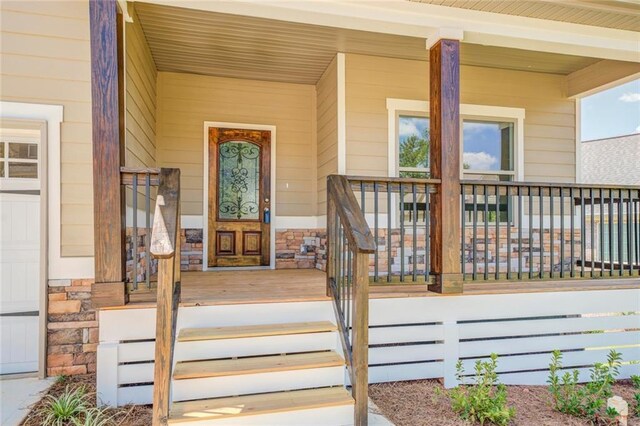 property entrance with a porch