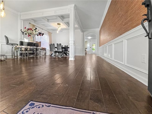 interior space with crown molding, plenty of natural light, beamed ceiling, and coffered ceiling