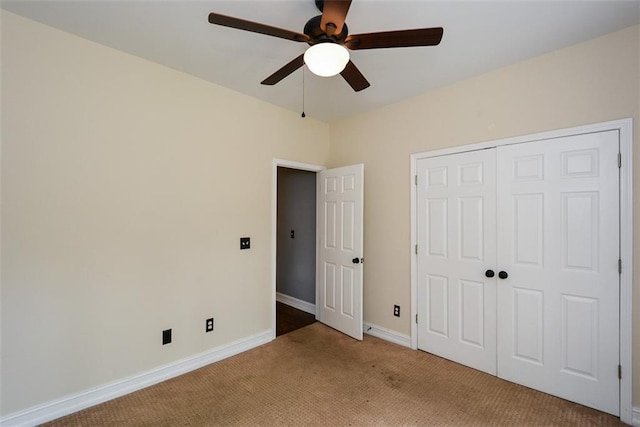 204 Maple Creek Chase, Woodstock, GA 30188 - unfurnished bedroom featuring a closet, baseboards, ceiling fan, and carpet