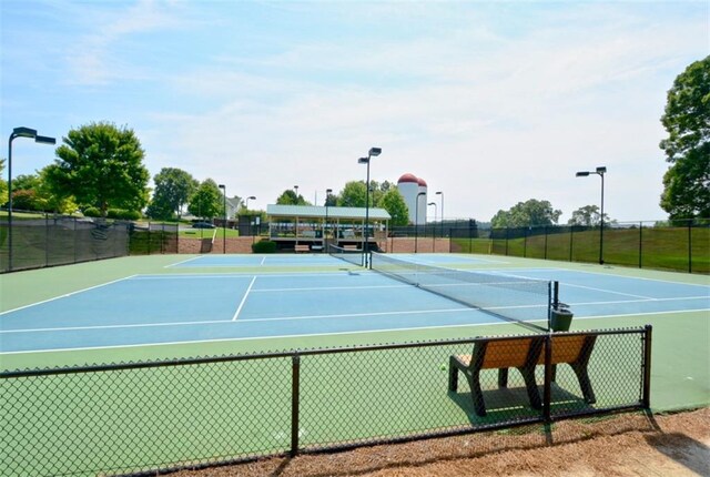 204 Maple Creek Chase, Woodstock, GA 30188 - view of tennis court with fence and community basketball court