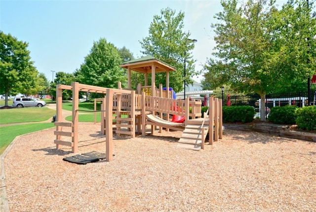 204 Maple Creek Chase, Woodstock, GA 30188 - community jungle gym featuring a lawn