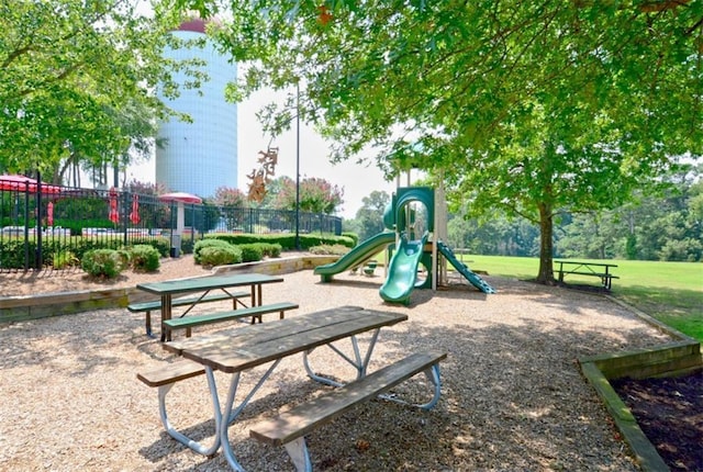 204 Maple Creek Chase, Woodstock, GA 30188 - community jungle gym featuring fence