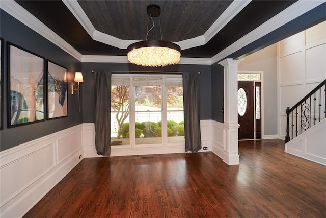 204 Maple Creek Chase, Woodstock, GA 30188 - foyer featuring a tray ceiling, wood ceiling, a decorative wall, and decorative columns