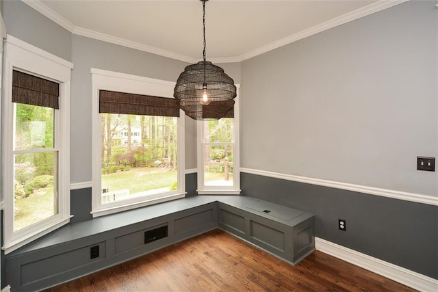 204 Maple Creek Chase, Woodstock, GA 30188 - unfurnished dining area featuring wood finished floors, baseboards, and ornamental molding