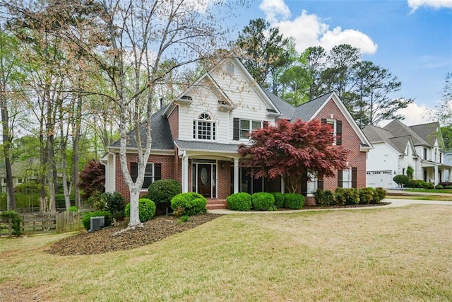 204 Maple Creek Chase, Woodstock, GA 30188 - view of front of property featuring a shingled roof, a front lawn, and brick siding