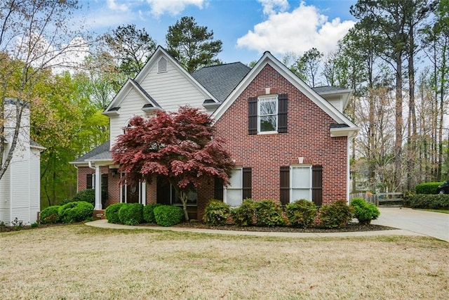204 Maple Creek Chase, Woodstock, GA 30188 - traditional home with brick siding and a front lawn