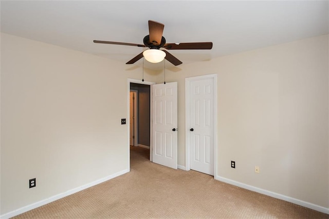 204 Maple Creek Chase, Woodstock, GA 30188 - spare room with light colored carpet, baseboards, and ceiling fan
