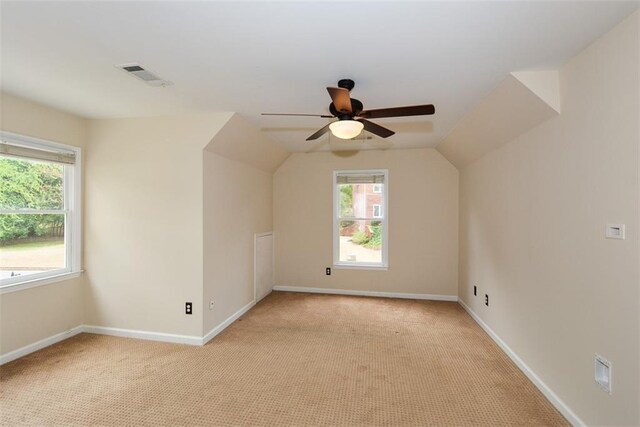 204 Maple Creek Chase, Woodstock, GA 30188 - additional living space featuring visible vents, baseboards, a ceiling fan, light colored carpet, and lofted ceiling
