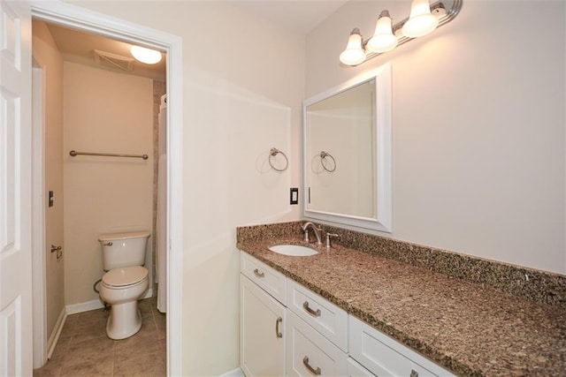 204 Maple Creek Chase, Woodstock, GA 30188 - bathroom with vanity, tile patterned flooring, visible vents, toilet, and baseboards