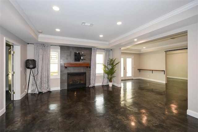 204 Maple Creek Chase, Woodstock, GA 30188 - unfurnished living room with concrete floors, recessed lighting, a tiled fireplace, a raised ceiling, and baseboards