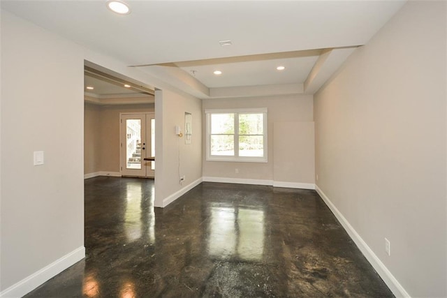 204 Maple Creek Chase, Woodstock, GA 30188 - spare room featuring recessed lighting, concrete floors, a tray ceiling, and baseboards
