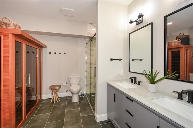 204 Maple Creek Chase, Woodstock, GA 30188 - bathroom with a shower stall, baseboards, a sink, and toilet