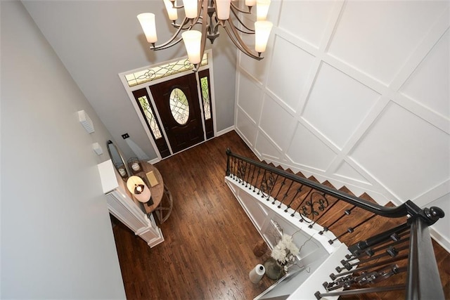 204 Maple Creek Chase, Woodstock, GA 30188 - foyer with baseboards, stairway, a notable chandelier, and dark wood finished floors