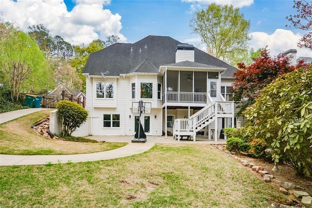 204 Maple Creek Chase, Woodstock, GA 30188 - back of house featuring a sunroom, a lawn, a patio area, and stairs