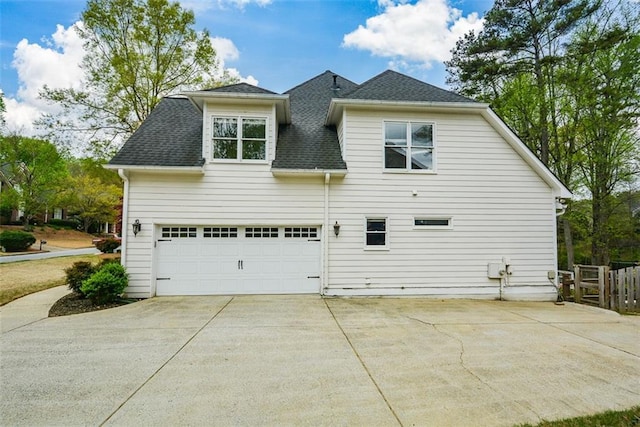 204 Maple Creek Chase, Woodstock, GA 30188 - view of side of property with a garage, roof with shingles, and driveway