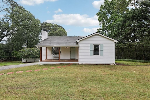 16064 Hopewell Rd, Alpharetta, GA 30004 - ranch-style house featuring a porch, a front yard, gravel driveway, and a chimney