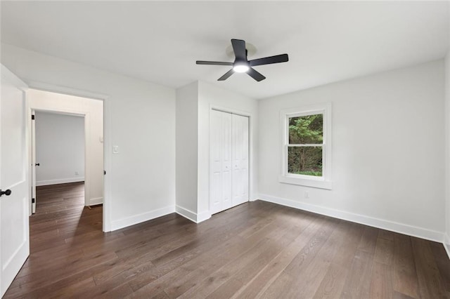 16064 Hopewell Rd, Alpharetta, GA 30004 - unfurnished bedroom with dark wood-style floors, a closet, baseboards, and a ceiling fan