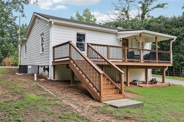 16064 Hopewell Rd, Alpharetta, GA 30004 - back of property featuring a wooden deck, stairs, central air condition unit, and a lawn
