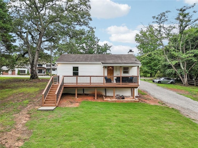 16064 Hopewell Rd, Alpharetta, GA 30004 - rear view of property with stairway, a chimney, a lawn, and a deck