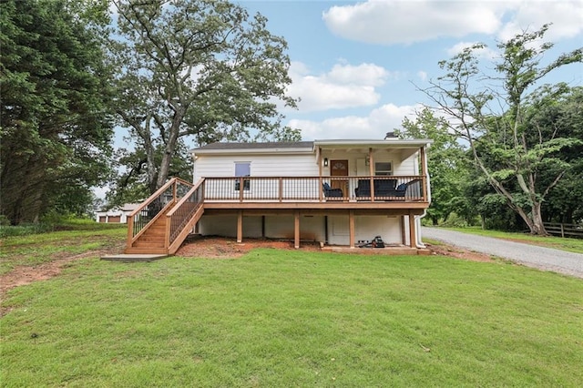 16064 Hopewell Rd, Alpharetta, GA 30004 - back of property featuring a lawn, gravel driveway, a wooden deck, and stairs