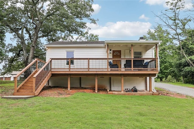 16064 Hopewell Rd, Alpharetta, GA 30004 - rear view of house featuring a lawn, a wooden deck, stairway, and driveway