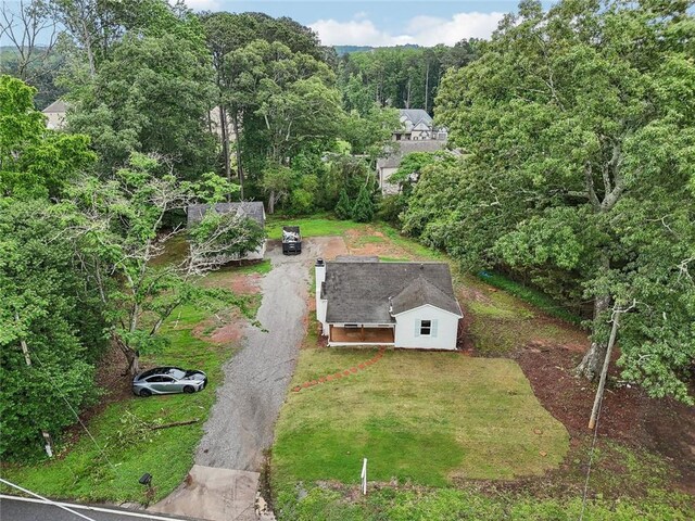 16064 Hopewell Rd, Alpharetta, GA 30004 - aerial view of property and surrounding area featuring a heavily wooded area