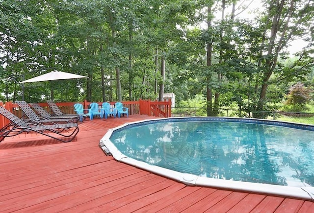 outdoor pool with a deck